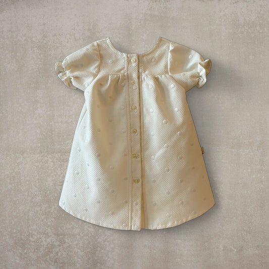 Vestido largo en piqué beige con motas