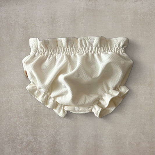 Braguita beige con motitas