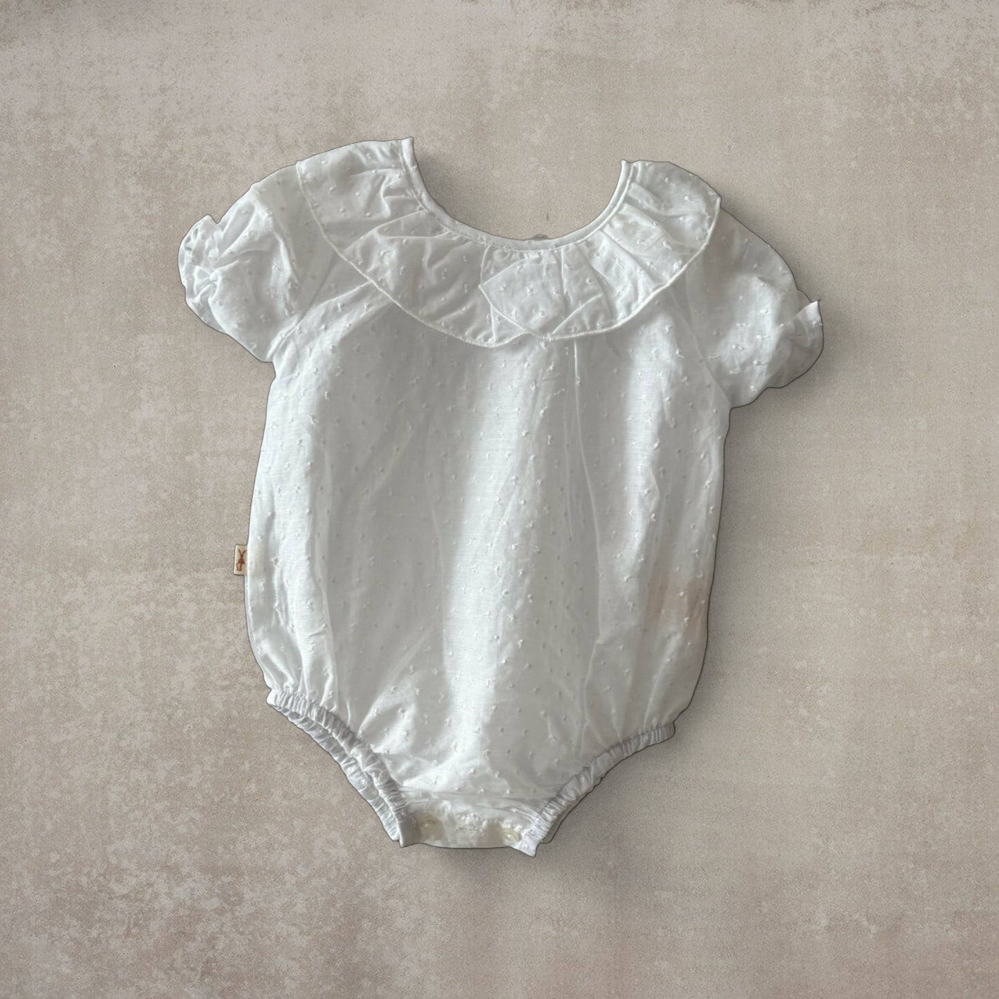 Camisa body plumeti. Manga corta