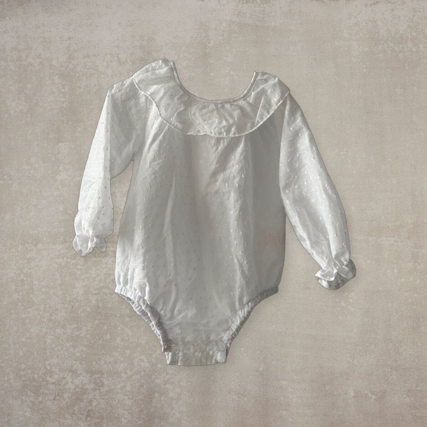 Camisa body plumeti. Manga larga