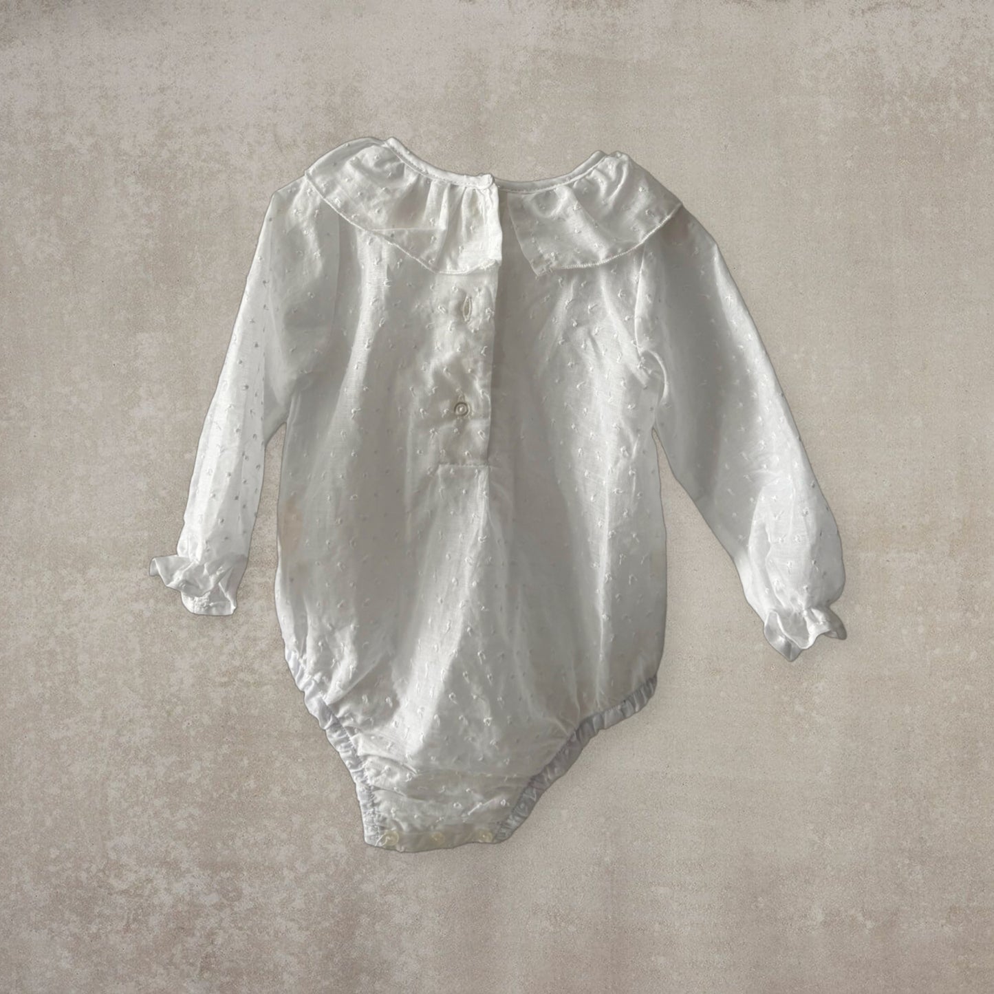 Camisa body plumeti. Manga larga