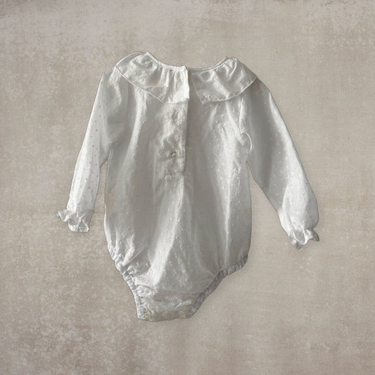 Camisa body plumeti. Manga larga