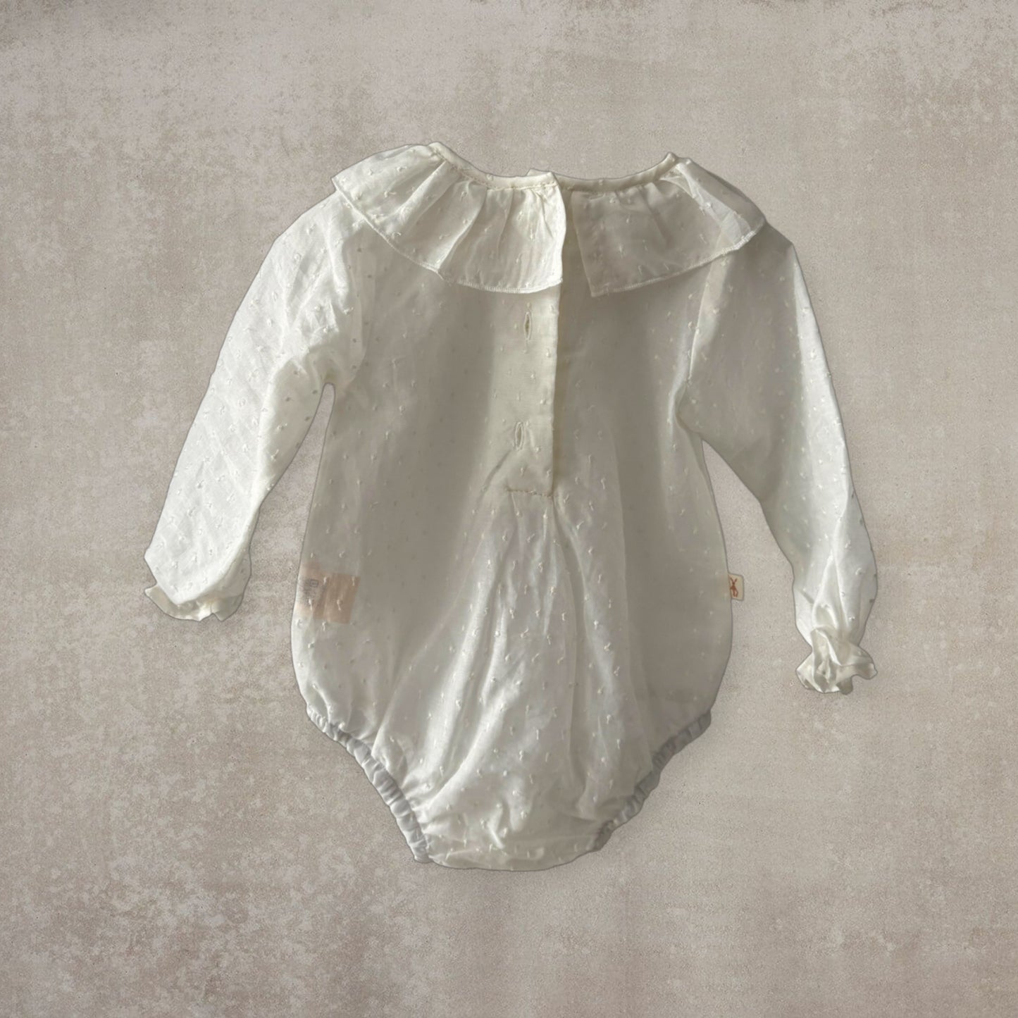 Camisa body plumeti. Manga larga