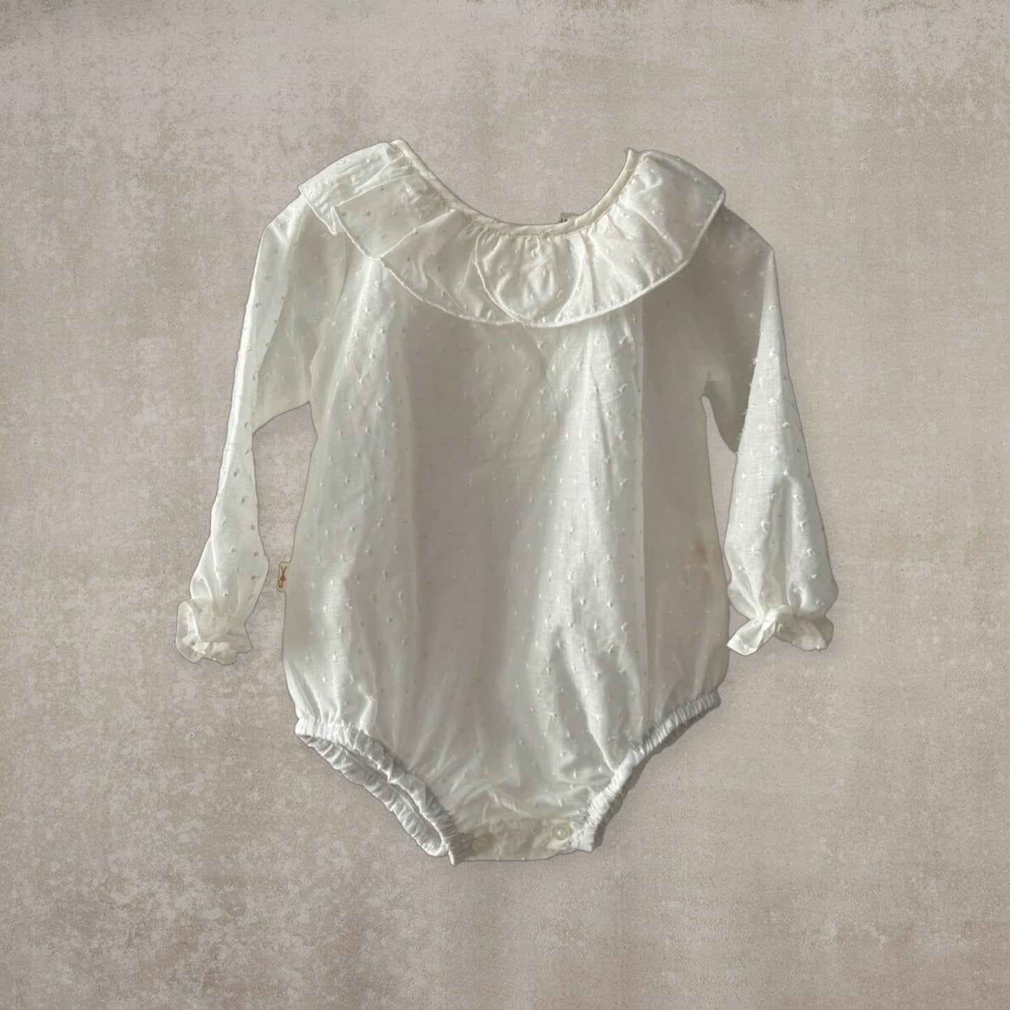 Camisa body plumeti. Manga larga