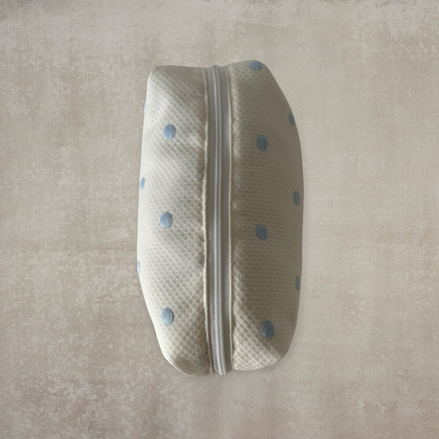 Neceser de aseo acolchado con estampado de motas azules